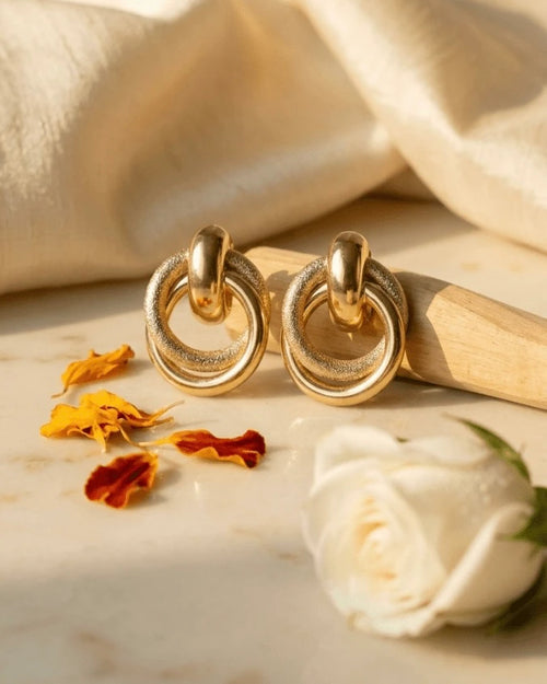 Golden earring type studs with golden rings design with texture 