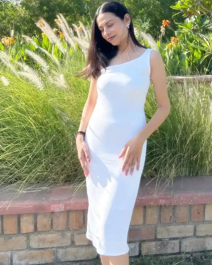 Model wearing white one shoulder dress with detachable beads neck accessories Full view 