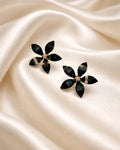 Daisy shape flower earring studs with black colour diamonds on it