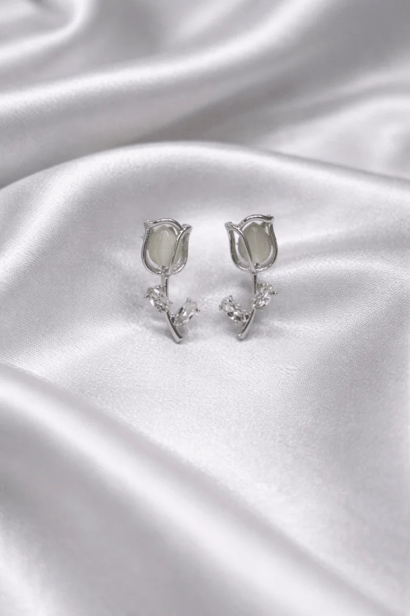 Tulip flower like earring studs with small diamonds on it , silver colour