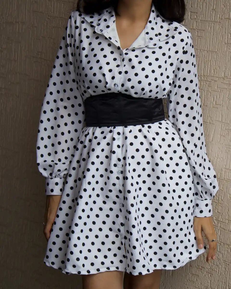 white polka dot shirt dress with corset belt and bell sleevs with cuff with aline flare