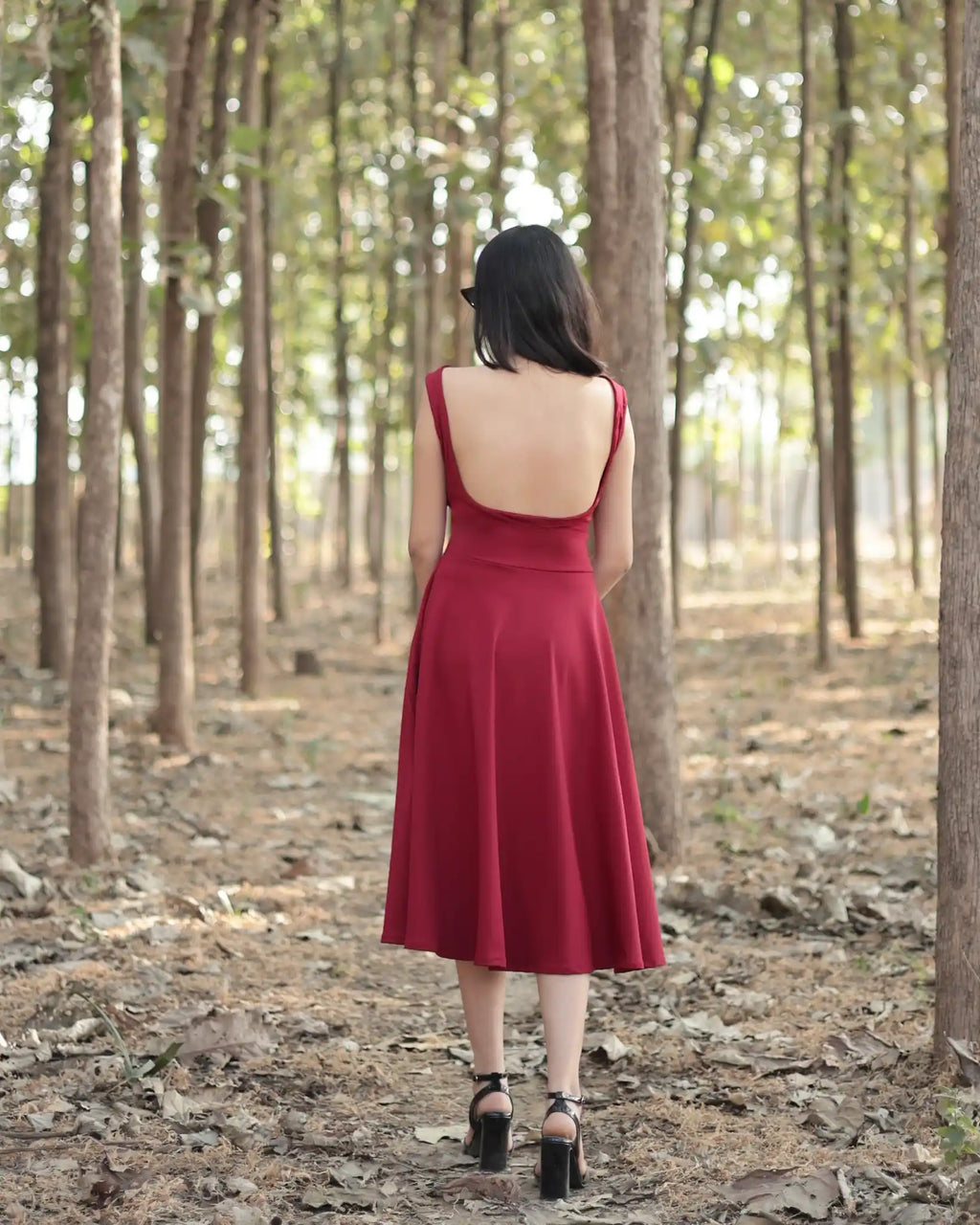 Maroon calf length dress with square neck and backless pattern with sleeve less, circular bottom dress back side image 