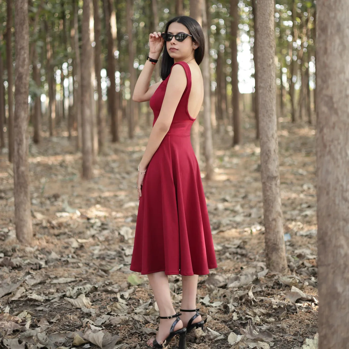 Scarlet muse dress in maroon colour and backless design fashion desi