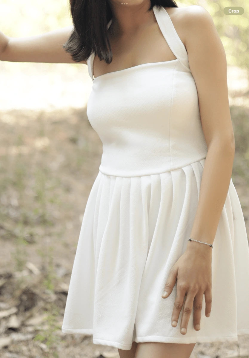 Model wearing white colour corset mini dress with tie neck straps , cod dresses India 