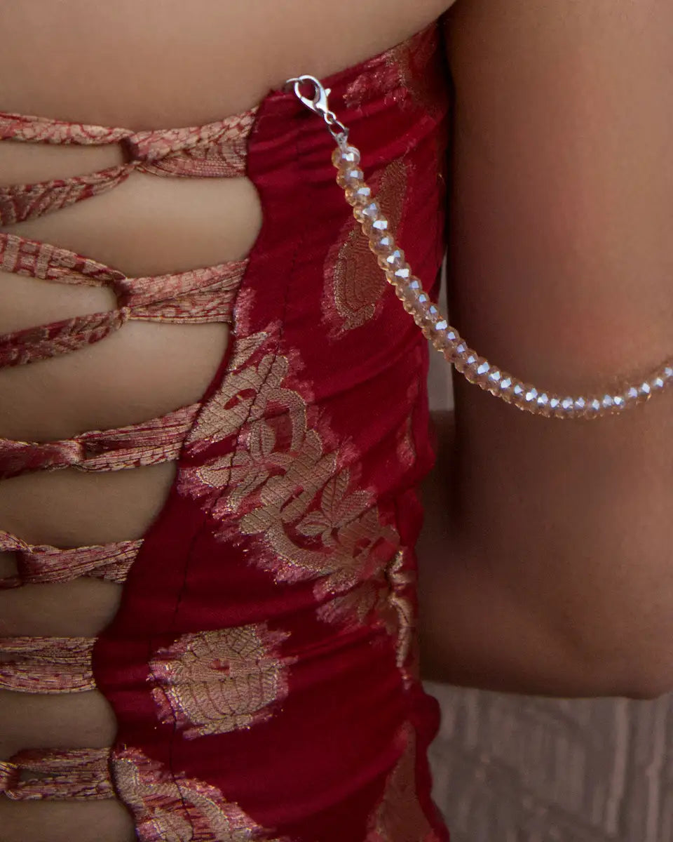 chatpate y2k top for women , shown the backside of the top with detachable beads design