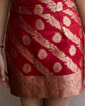 Maroon gold woven mini skirt with brocade border styled with matching top